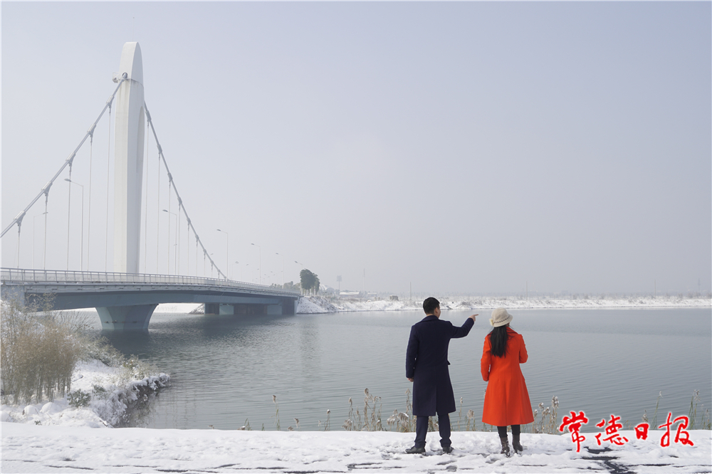廖學春-柳葉湖賞雪-1.jpg